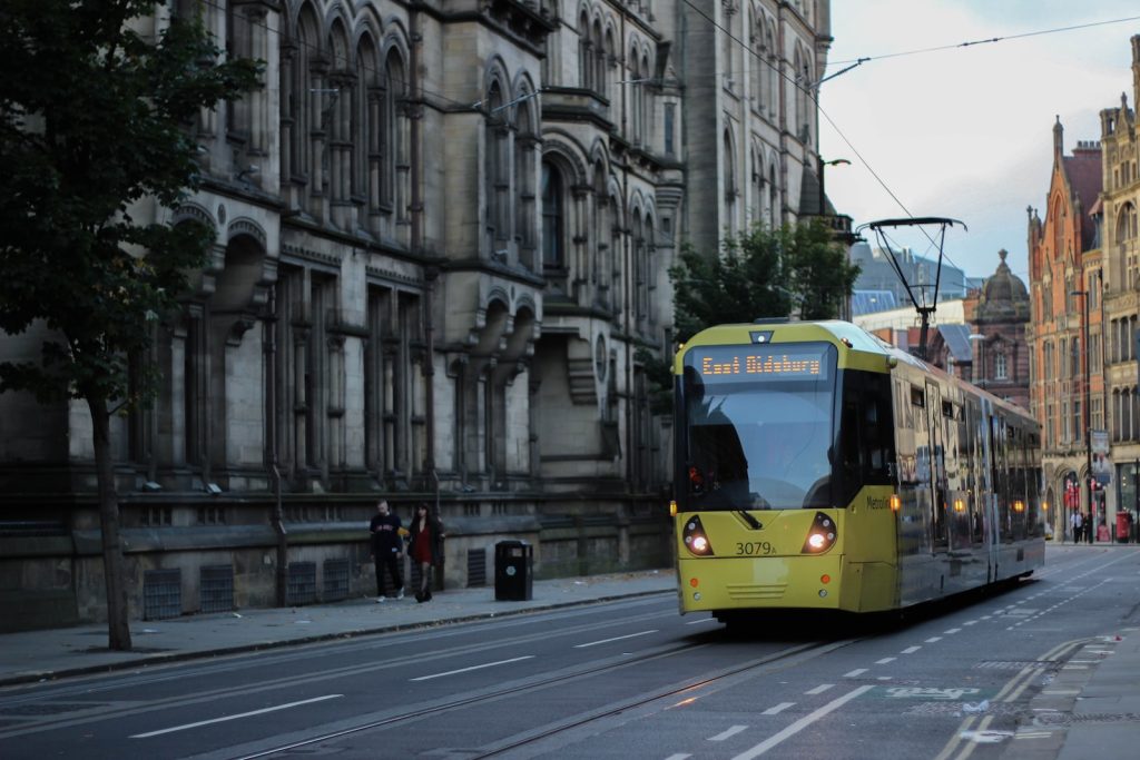 yellow and white tram